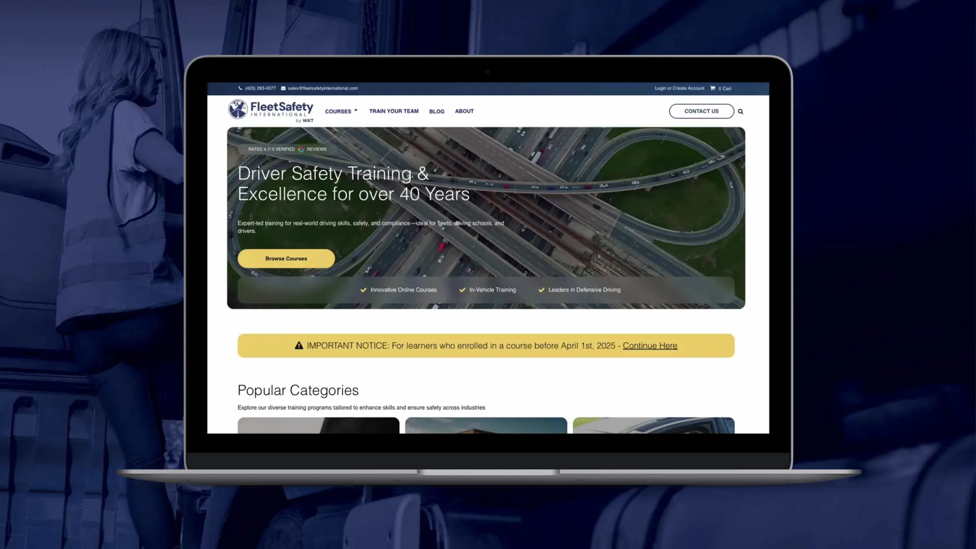 A laptop showing the new Fleet Safety International homepage and its driver safety training courses.