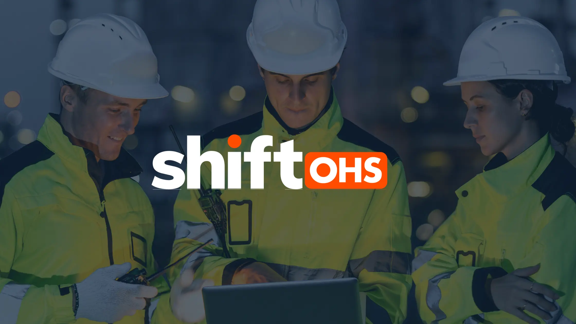 Shift OHS logo over a photo of three workers in hi-vis jackets and hard hats looking at a laptop.
